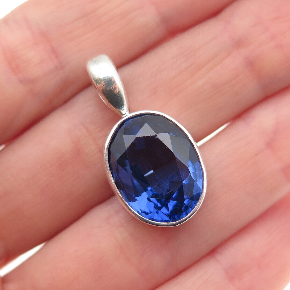 925 Sterling Silver Vintage Oval-Cut Blue C Z Charm Pendant